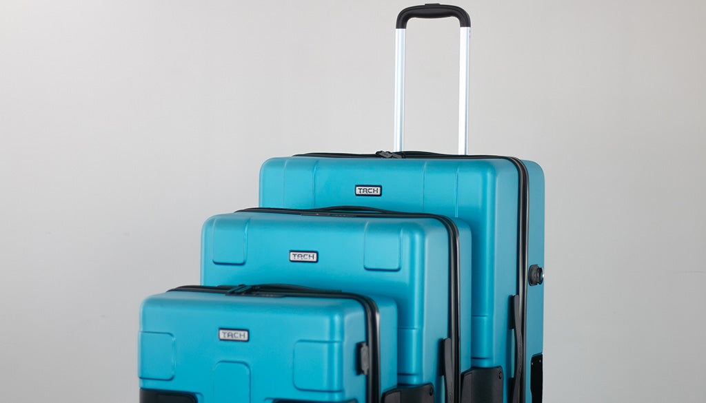 What is the design philosophy behind TACH Luggage?